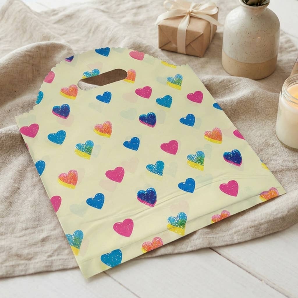 50pc, Colorful Hearts Print Beige Cut-out Handle PVC Bag
