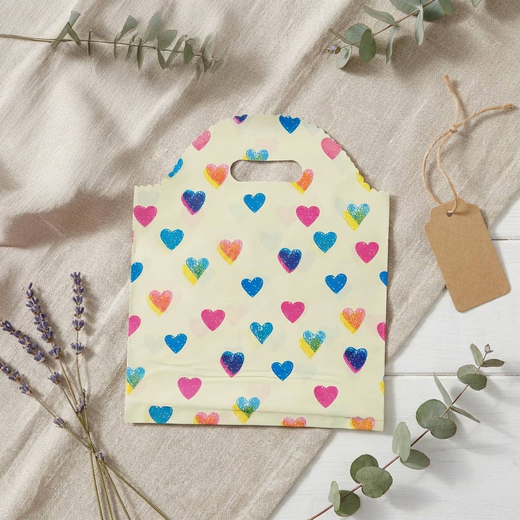 50pc, Colorful Hearts Print Beige Cut-out Handle PVC Bag