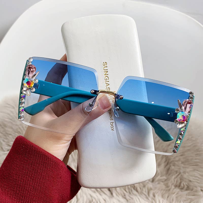 Exquisitely crafted side-rimmed diamond-studded sunglasses